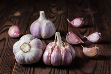 Garlic bulb on wooden background. Close up