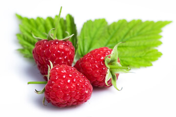 Raspberry with leaves. Raspberry isolated on white background.