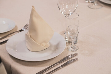 Banquet table with wineglasses. High angle of elegant banquet table served for wedding celebration