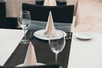 Banquet table with wineglasses. High angle of elegant banquet table served for wedding celebration