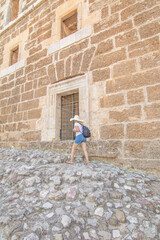 Woman tourist  visiting The Theatre of Aspendos Ancient City in Antalya