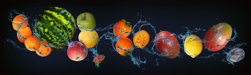 Panorama with fruits in water - juicy plum, mango, lemon, persimmon, apple, watermelon, orange - a...