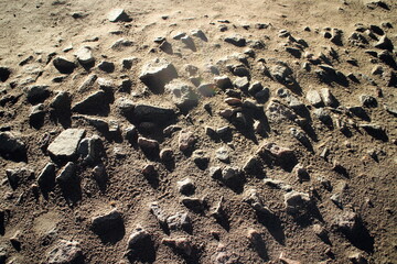 stones covered with sand in the village