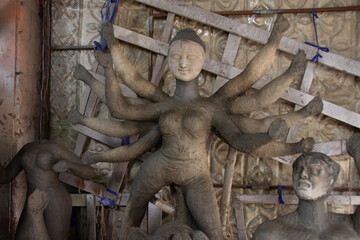 Clay idol of Hindu Goddess Durga under preparations for Bengal's Durga Puja festival at Kumartuli...
