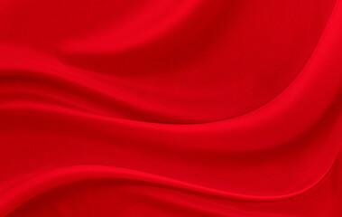 Black red satin dark fabric texture luxurious shiny that is abstract silk cloth background with patterns soft waves blur beautiful.