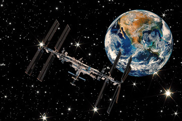 Obraz na płótnie Canvas International space station and the earth globe. View from space.The elements of this image furnished by NASA.