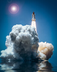 A rocket launch with clouds of smoke. The elements of this image furnished by NASA.