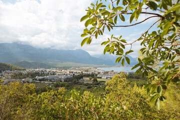 Scenic view of trees, Mediterranean sea and mountains against sky