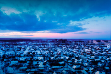 Fototapeta premium Evening cottage district, suburbs, drone view. View of the city