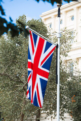 Fototapeta na wymiar London, UK. British flags on Pall Mall during funeral ceremony of Queen Elizabeth II