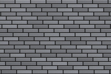 A wall of gray brick and dark cement. Pattern of new brickwork.
