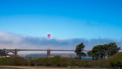 The Golden Gate Bridge with the San Francisco Fog around it. The top of one of the vertical...