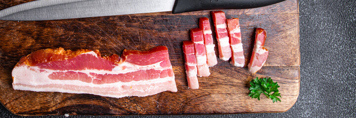 bacon lard meat strips pork healthy meal food snack diet on the table copy space food background...