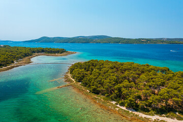 Aerial view about Otok Školjić next to St. Nicholas Fortress (Croatian: Tvrđava sv. Nikole) which located at the entrance to St. Anthony Channel, near the town of Šibenik in central Dalmatia, Croatia.