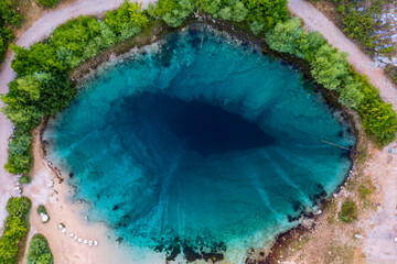 Aerial top down view about Cetina River Spring (Izvor Cetine), also known as the Eye Of The Earth...