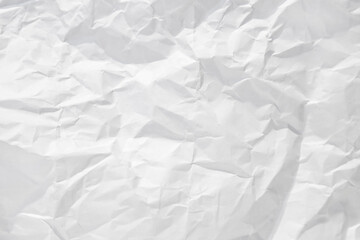Background for design with space for text or image. White crumpled paper texture background.