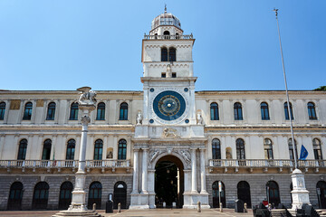 Fototapeta na wymiar Historic clock tower in Plazza dei Signori in the city of Padua
