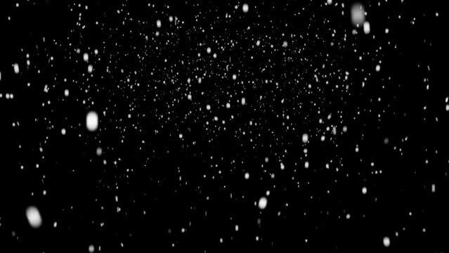Snow flakes overlay coming to camera in a big storm on black background. Winter Christmas animated effect.