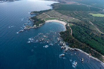 Fototapeta na wymiar Aerial view of beautiful bay with rocks and blue water
