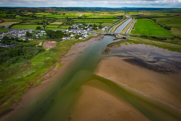 Cefni Estuary birds-eye view of the village of Malltraeth, Anglesey, Wales.