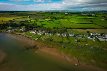 Cefni Estuary and a high angle view of the village of Malltraeth, Anglesey, Wales.