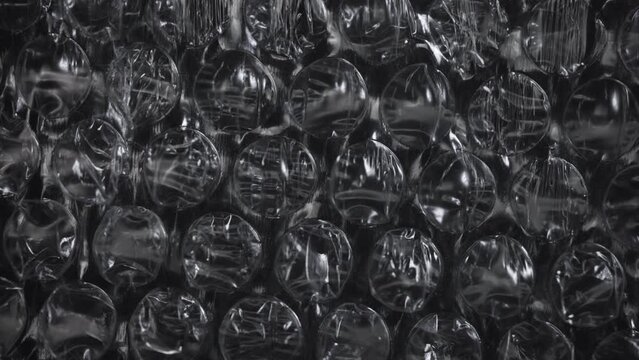 Bubble wrap over black background