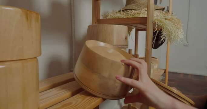 Professional milliner looks for right mold to make hat