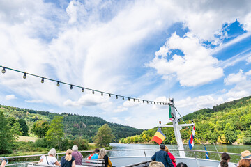 String of Lights on top of a boat traveling through lake Rursee, In the middle of the Eifel...