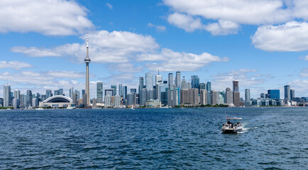 Toronto City downtown skyline. Water taxi on inner Harbour. Ontario, Canada.