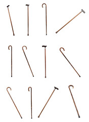 Set with elegant wooden walking canes on white background