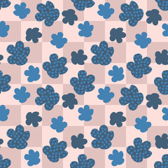 Groovy spotted flowers seamless pattern on checkered background. Retro floral print for fabric, paper, T-shirt. Summer  illustration for decor and design.