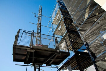 Obraz premium Construction Hoist in a Scaffold