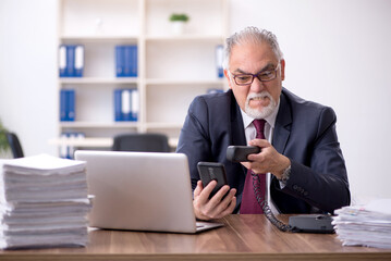 Old male employee and too much work in the office