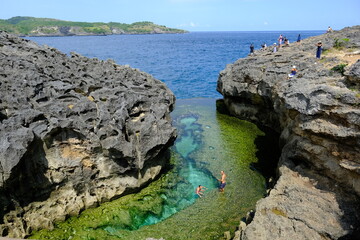 Indonesia Penida Island - Angel Billabong - natural pool framed rock cliffs