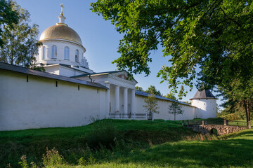View of the outer wall of the Holy Dormition Pskov-Pechersk Monastery and St. Michael's Cathedral...