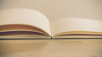 Recycled paper book on wooden background