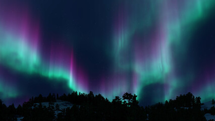 A beautiful green and red aurora dancing over the hills.