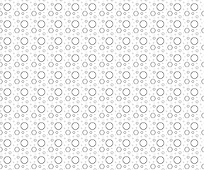 Fototapeta na wymiar Seamless black and white pattern, neatly arranged, beautiful and elegant. Circles (big and small) pattern for textiles, tiles, carpets.