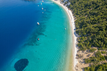 Fototapeta na wymiar Aerial photo of the paradise beach of Gidaki in Ithaca, the beautiful Ionian island of Greece.