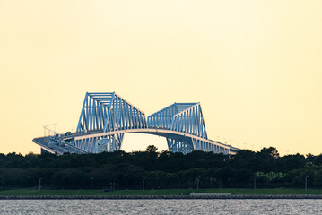 Gator bridge and yellow morning sky in Tokyo