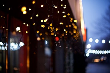 Night background of Christmas lights outside the cafe 