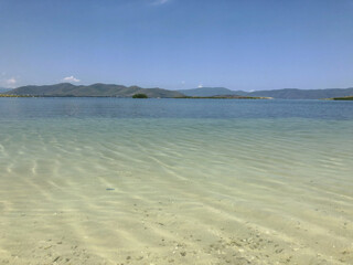 A pond with clear transparent water. Mountain Lake.  Lake Sevan in Armenia.