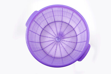 purple plastic basket which is usually used to place vegetables and fruit