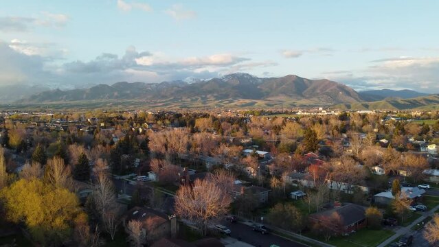 Aerial of the town and the Bridger Mountains in autumn in Bozeman, Montana.