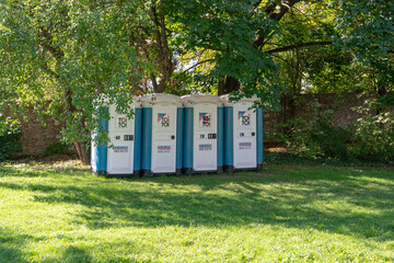 Banska Bystrica, Slovakia - September, 3, 2022 : Toi Toi portable public toilets in the city park. Banska Bystrica. Slovakia.