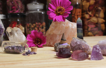 Amethyst Crystals With Flowers and Incense Cone on Meditation Table