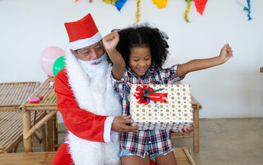 Christmas party, African girl and Santa claus