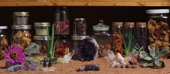 Amethyst Crystals and Chakra Stones on Australian Red Sand. Meditation Table