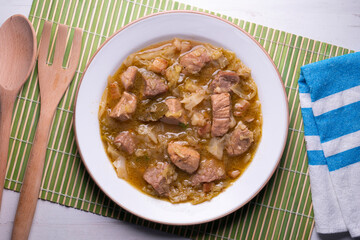 Pork stew with white cabbage. Typical Spanish winter recipe.