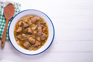 Pork stew with white cabbage. Typical Spanish winter recipe.